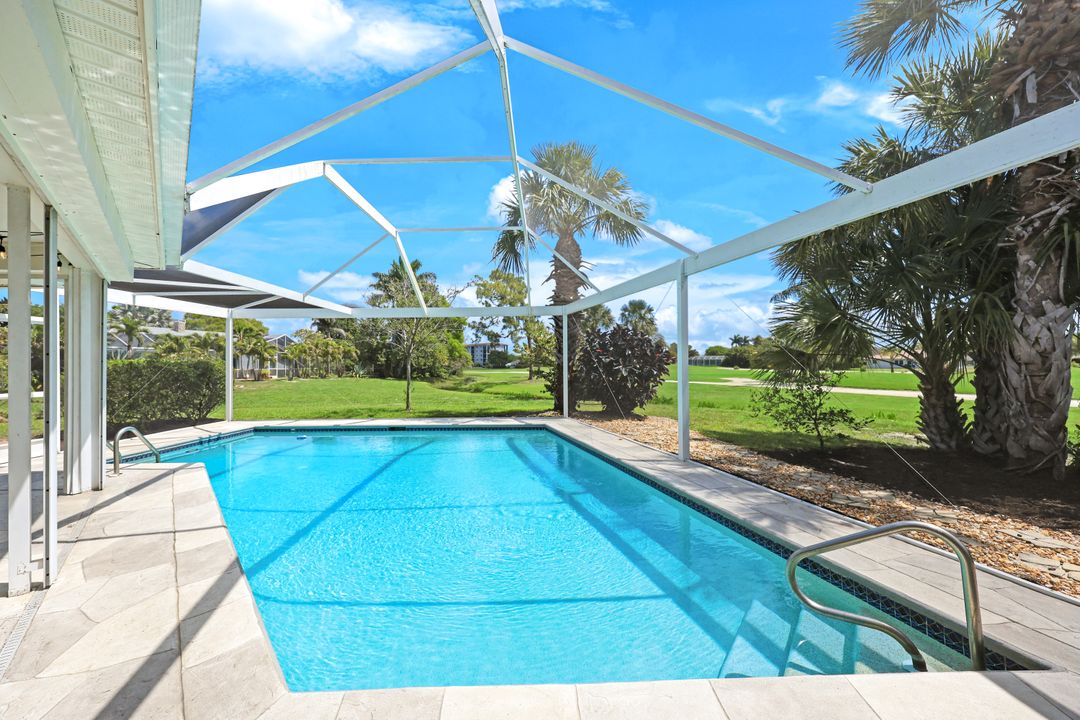169 Baltusrol Dr, Naples, FL 34113