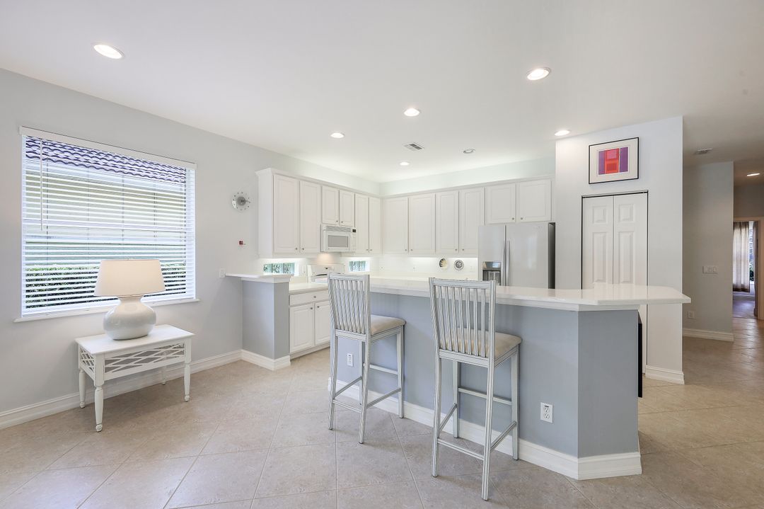 1902 Tarpon Bay Dr N  #101, Naples, FL 34119