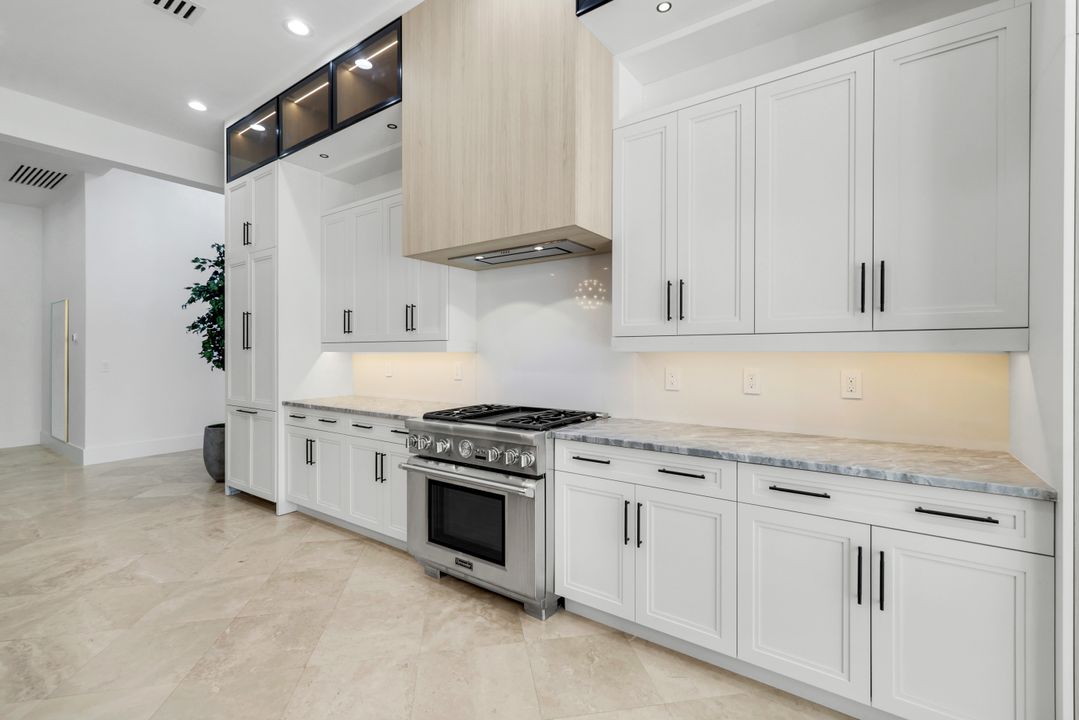 13087 Pond Apple Dr E, Naples, FL 34119