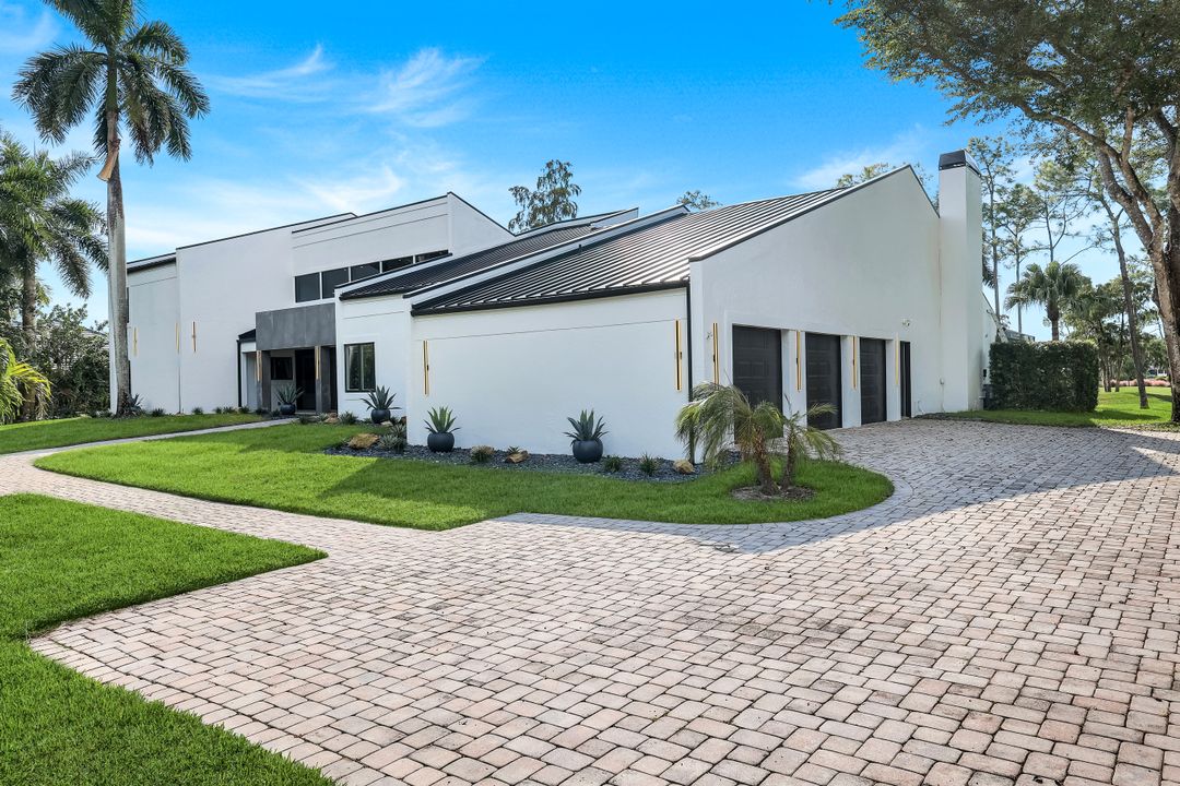 13087 Pond Apple Dr E, Naples, FL 34119