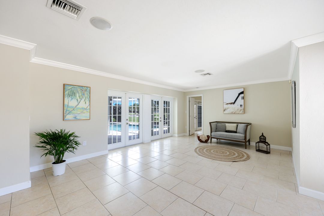 169 Baltusrol Dr, Naples, FL 34113