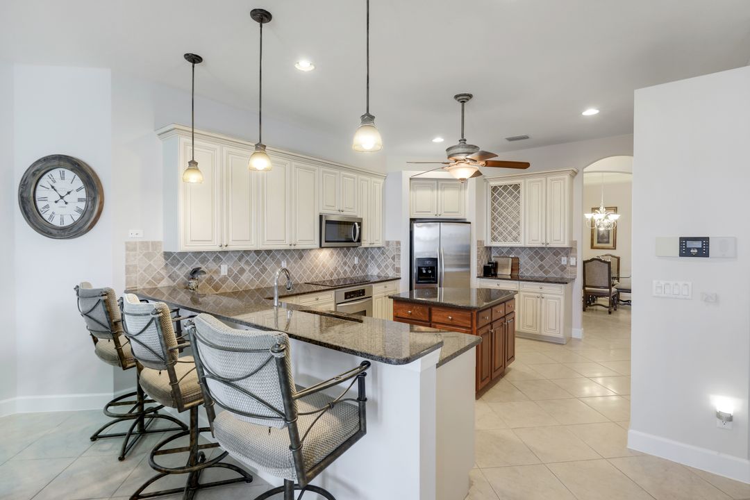 8765 Hideaway Harbor Ct, Naples, FL 34120