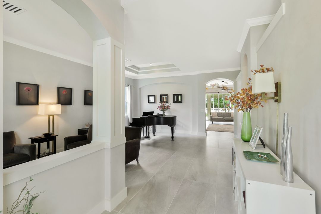 5717 Lago Villaggio Way, Naples, FL 34104