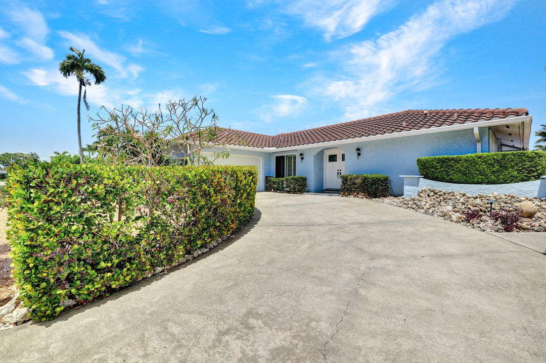 53 Madagascar Ct, Marco Island, FL 34145