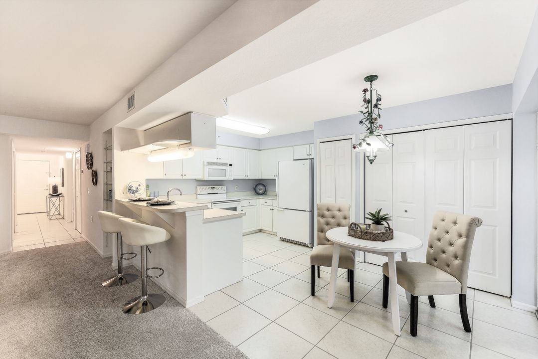 15465 Cedarwood Ln #7-202, Naples, FL 34110