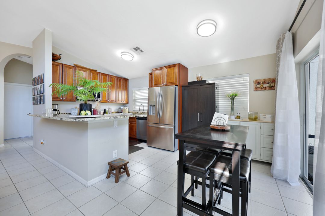 5018 Eclipse Ct, Naples, FL 34104