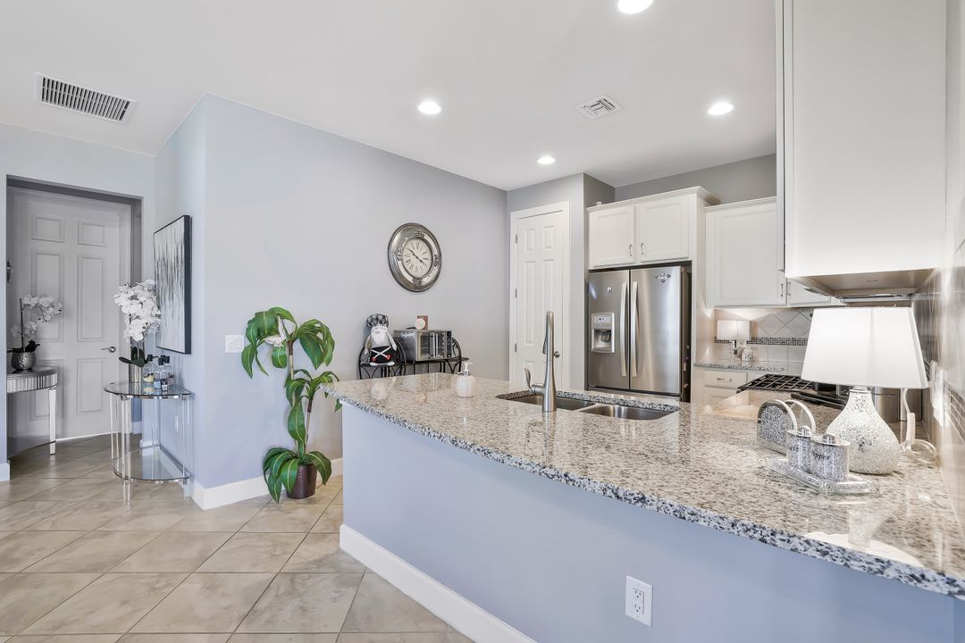 7659 Jacaranda Ln, Naples, FL 34114