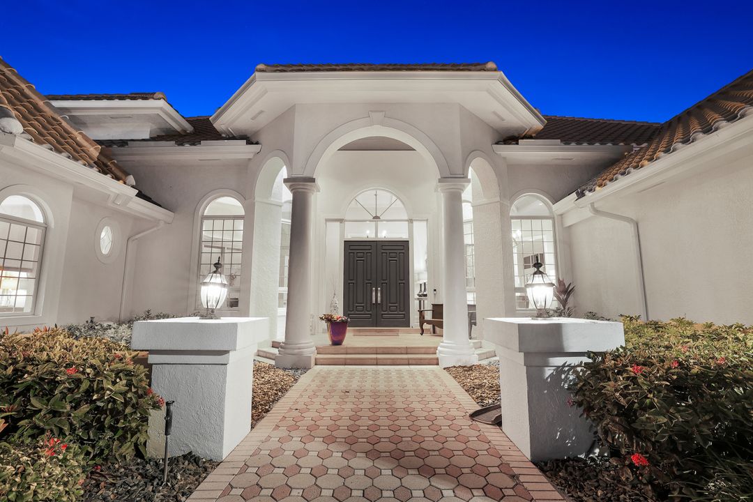 12924 Bald Cypress Ln, Naples, FL 34119