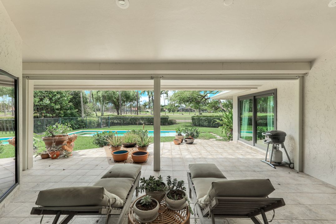 12975 Bald Cypress Ln, Naples, FL 34119