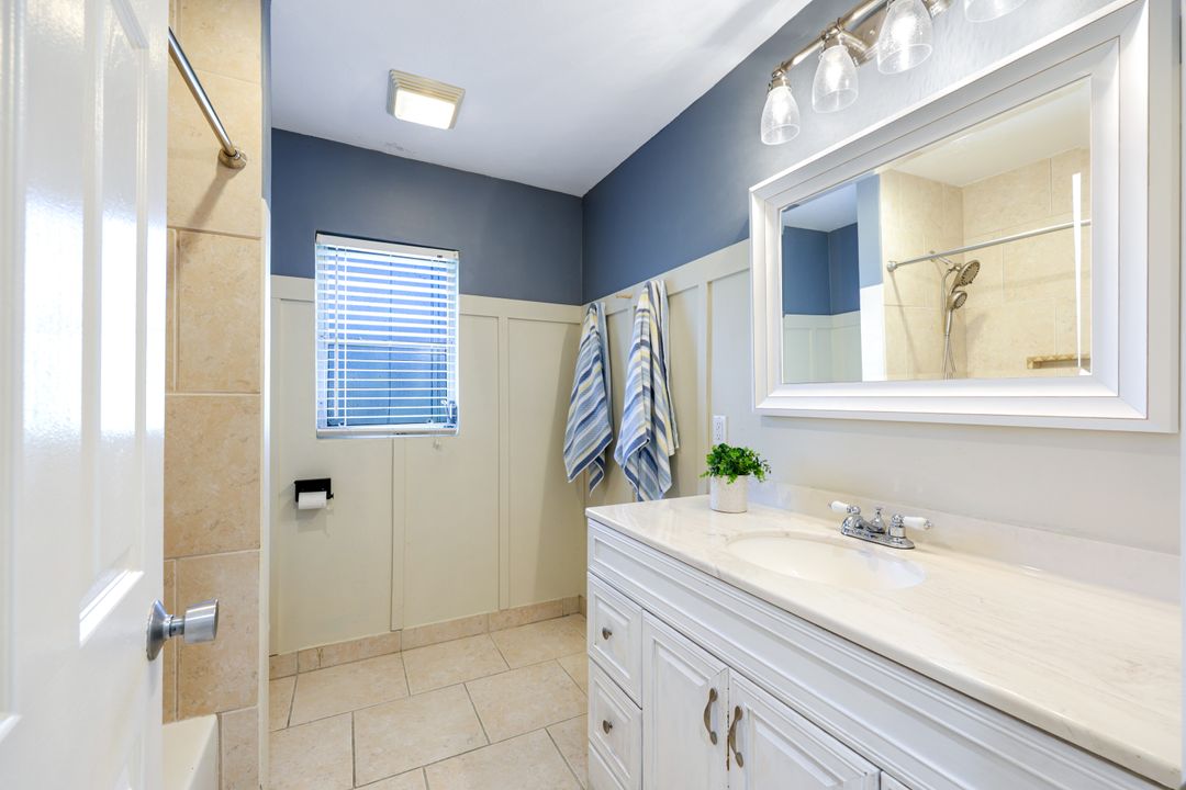 169 Baltusrol Dr, Naples, FL 34113
