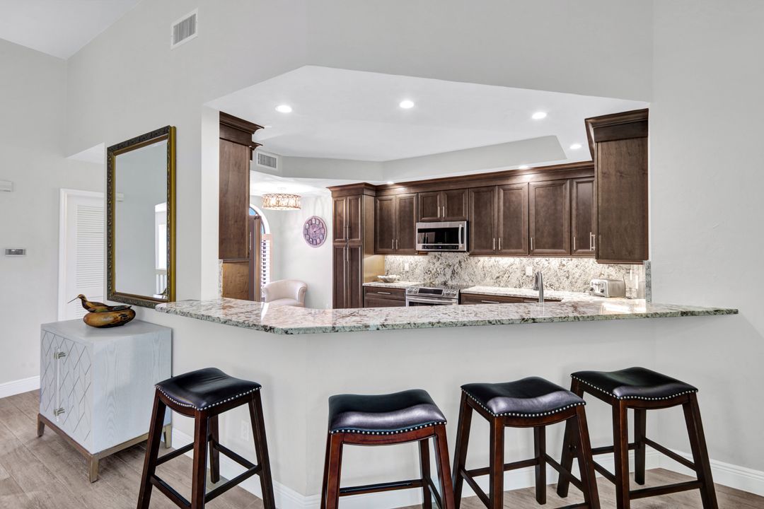 7056 Pelican Bay Blvd #201, Naples, FL 34108