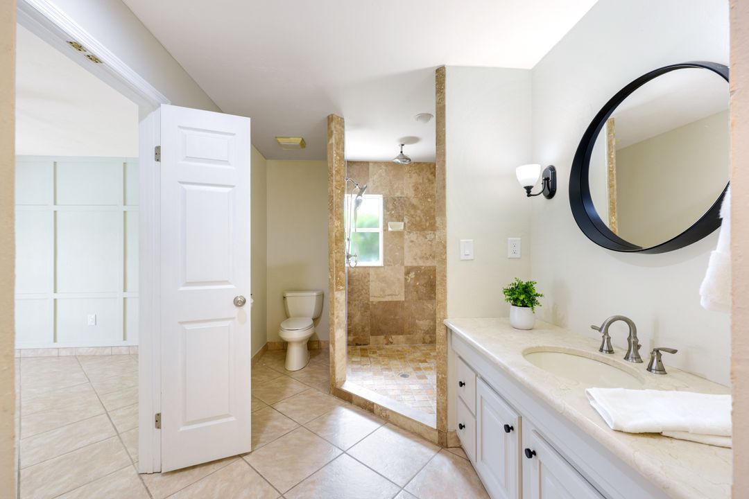 169 Baltusrol Dr, Naples, FL 34113