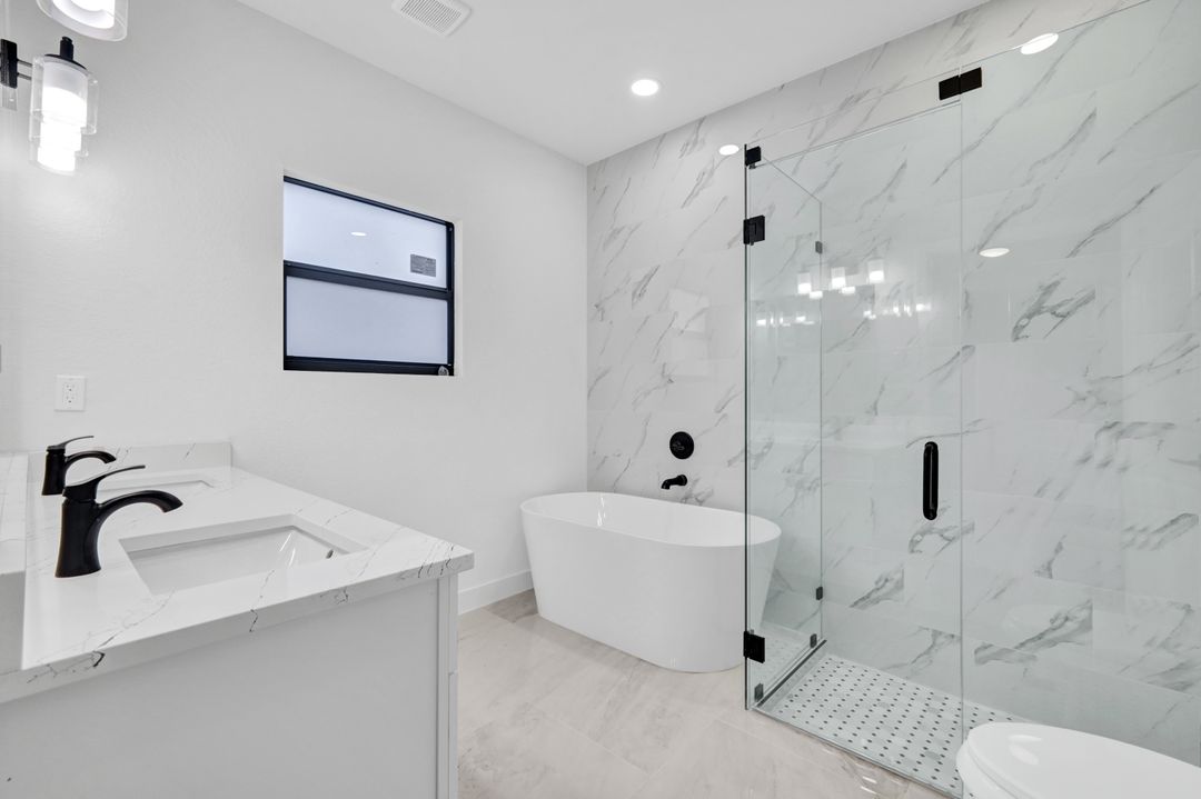 1222 Hilliard St E, Lehigh Acres, FL 33974