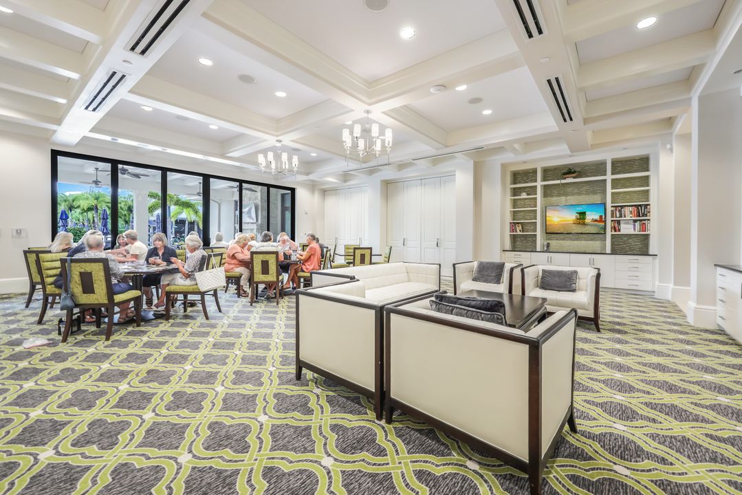 7408 Winding Cypress Dr, Naples, FL 34114