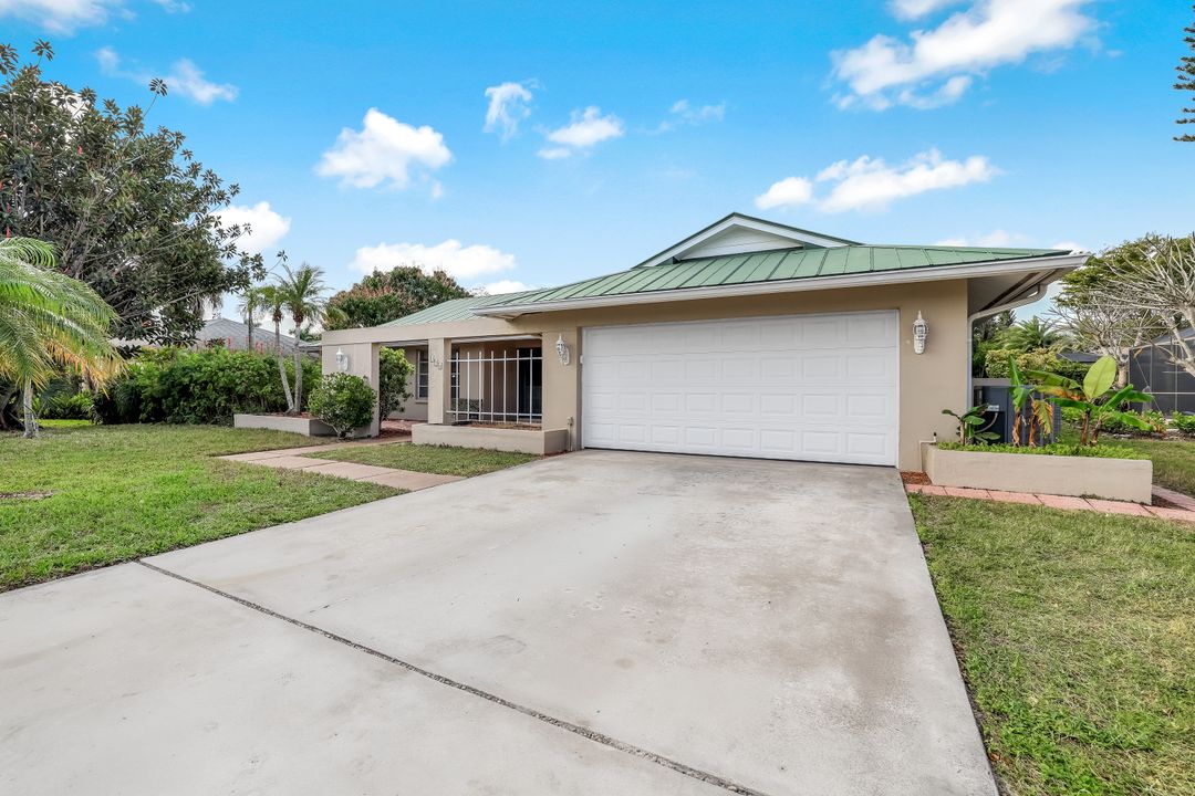 196 Baltusrol Dr, Naples, FL 34113