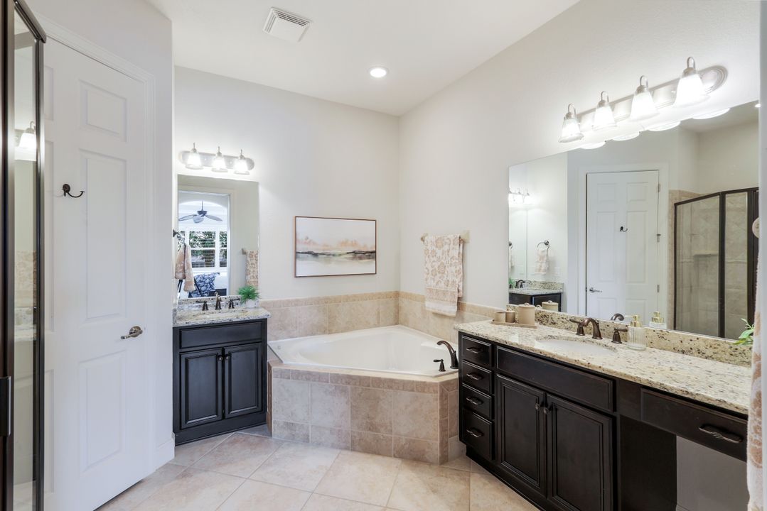 9557 Ironstone Terrace #202, Naples, FL 34120