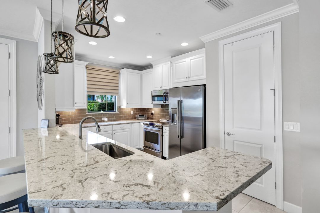 8772 Bellano Ct  #104, Naples, FL 34119