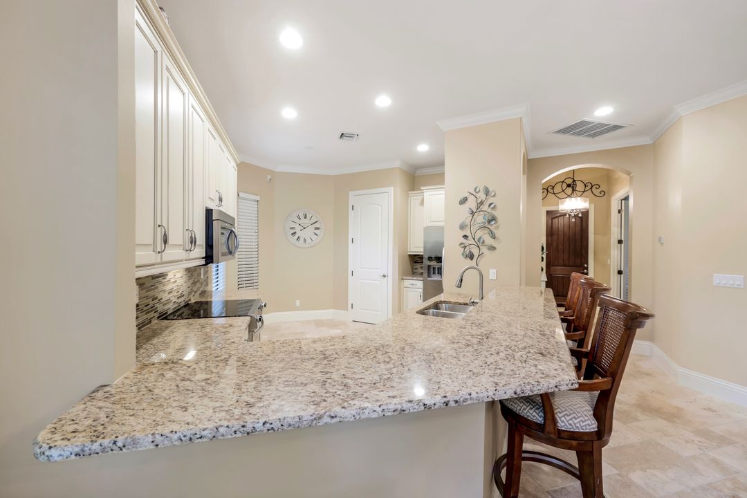 7598 Moorgate Point Way, Naples, FL 34113