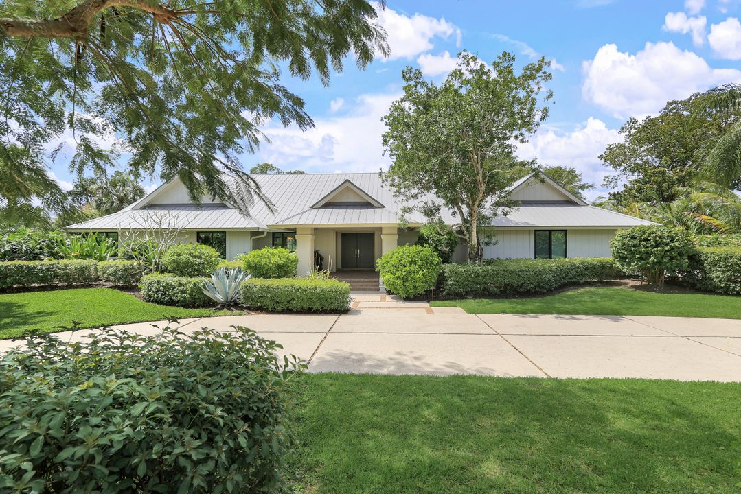 12975 Bald Cypress Ln, Naples, FL 34119