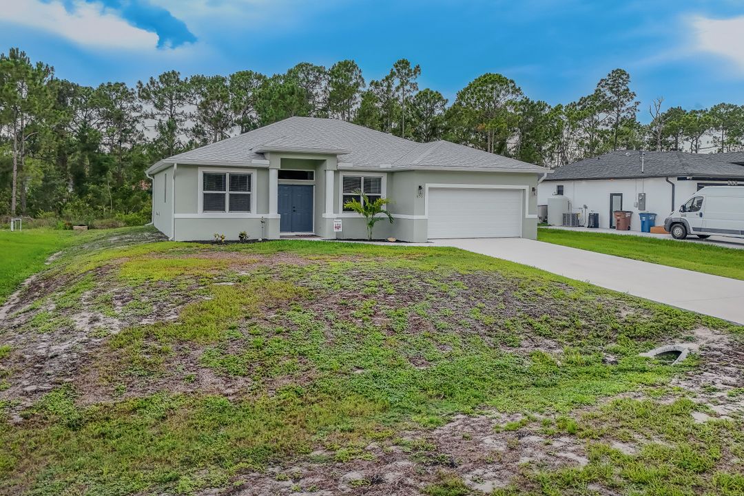 670 Nimitz Blvd, Lehigh Acres, FL 33974