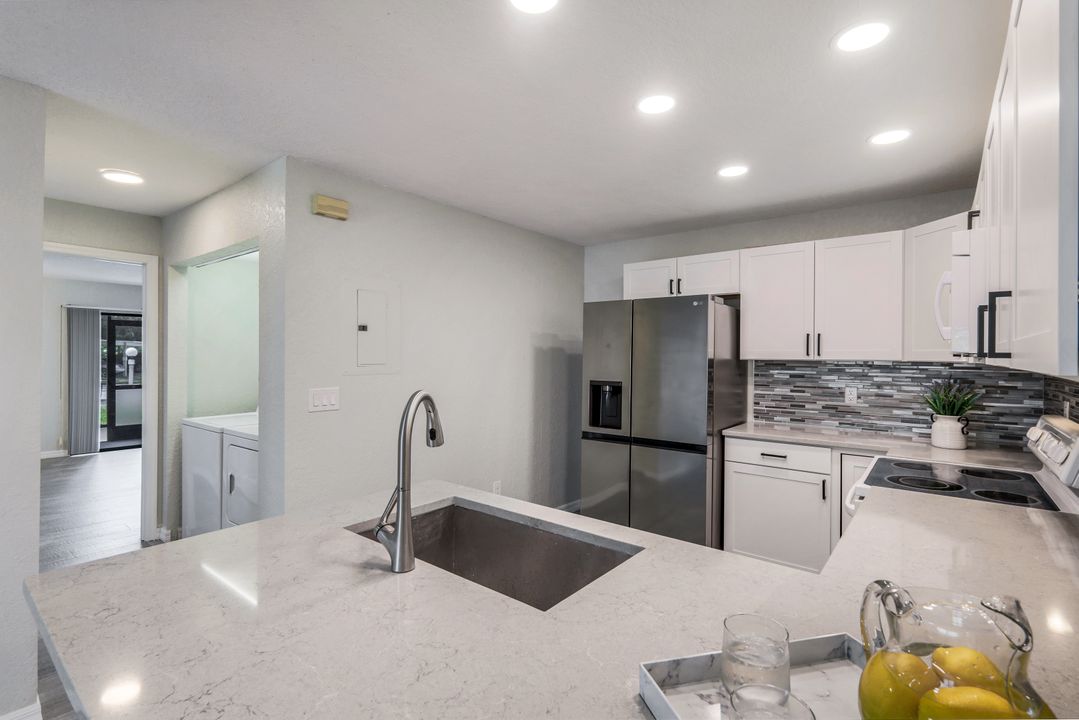 66 Emerald Woods Dr #H7, Naples, FL 34108