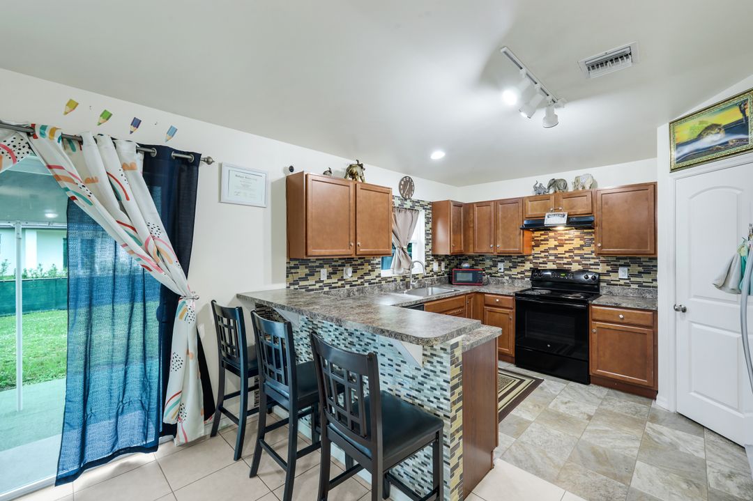 749 Chemstrand St E, Lehigh Acres, FL 33974