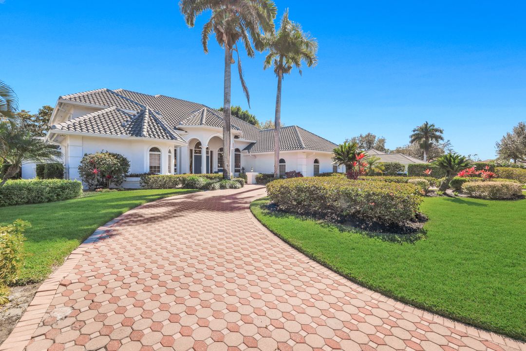 12924 Bald Cypress Ln, Naples, FL 34119