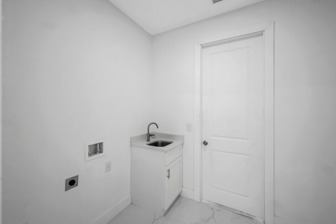 100 Parish Dr, Lehigh Acres, FL 33974