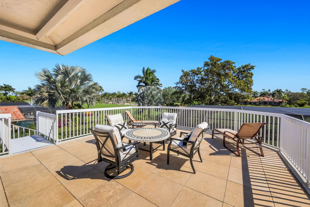 12924 Bald Cypress Ln, Naples, FL 34119