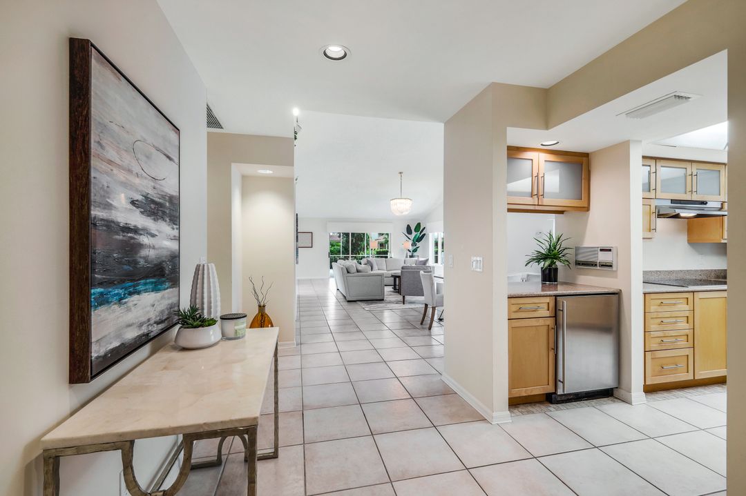 703 Heathery Ln, Naples, FL 34108