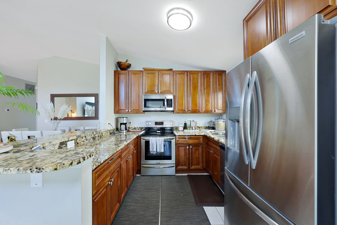 5018 Eclipse Ct, Naples, FL 34104