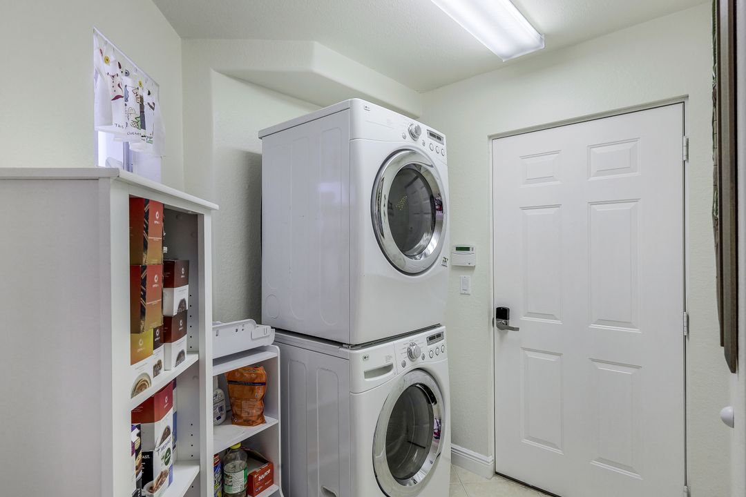 8687 Ibis Cove Cir, Naples, FL 34119