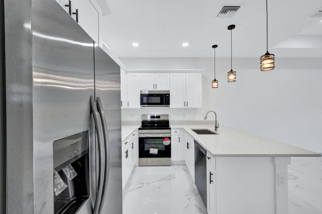 1237 Hillcrest St E, Lehigh Acres, FL 33974