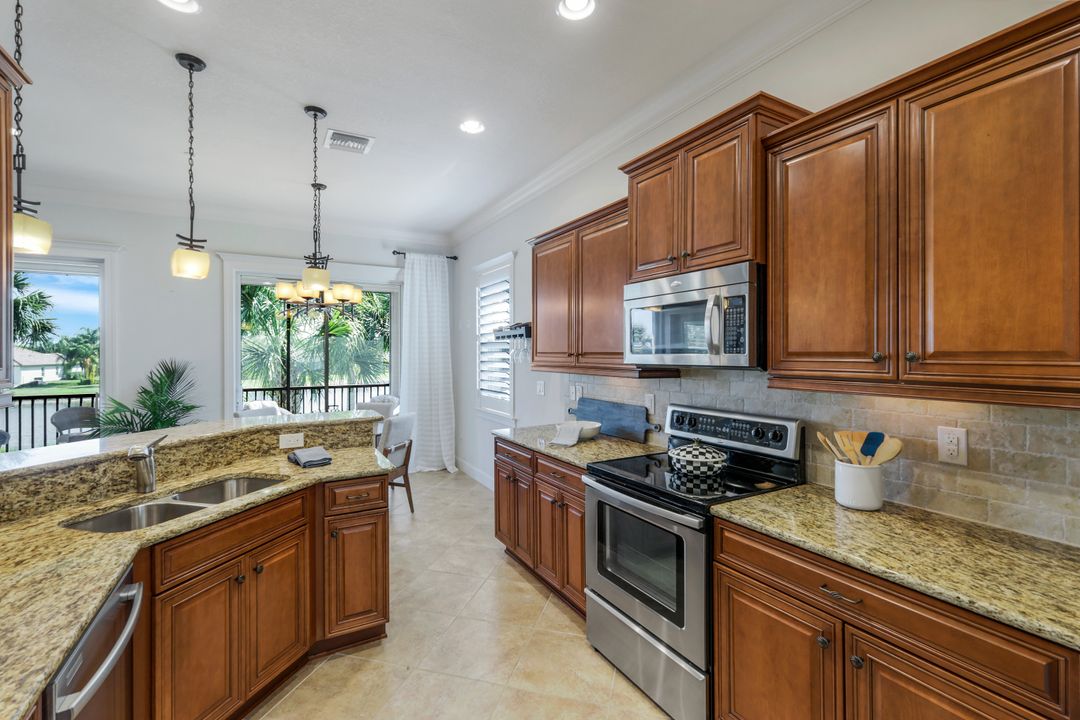 9557 Ironstone Terrace #202, Naples, FL 34120