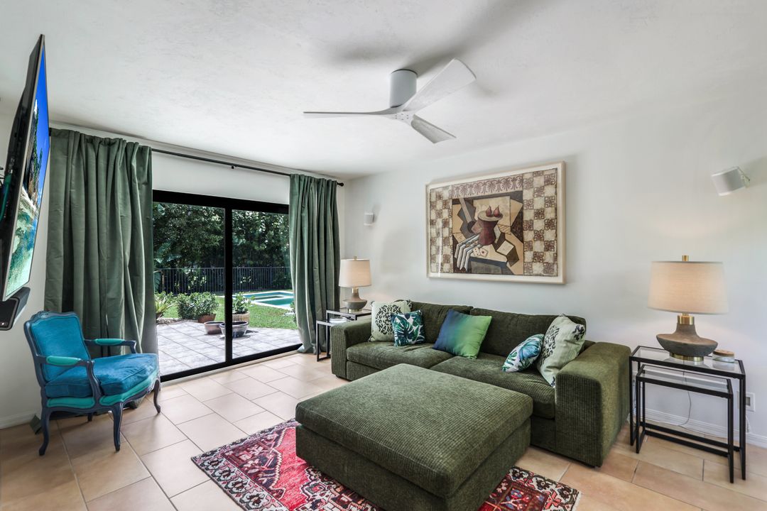 12975 Bald Cypress Ln, Naples, FL 34119