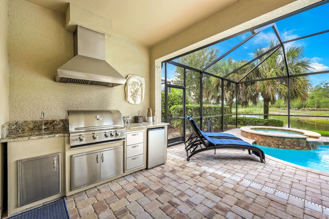 7408 Winding Cypress Dr, Naples, FL 34114
