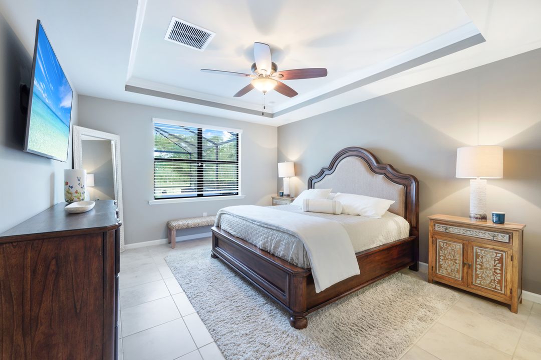 7408 Winding Cypress Dr, Naples, FL 34114