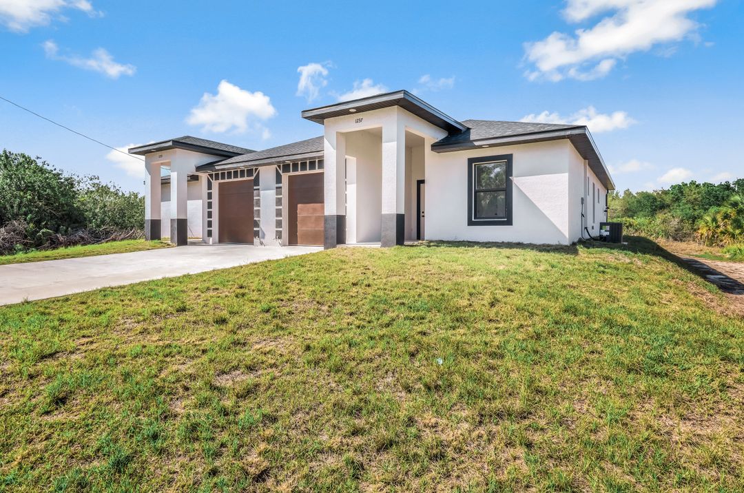 1235 Hillcrest St E, Lehigh Acres, FL 33974