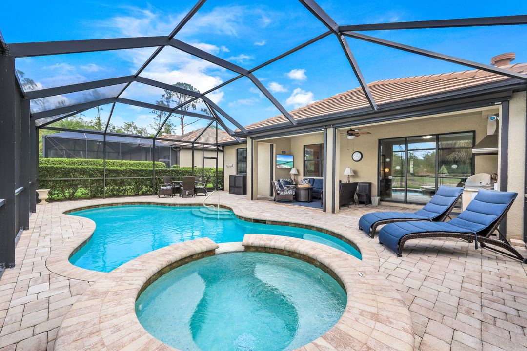 7408 Winding Cypress Dr, Naples, FL 34114