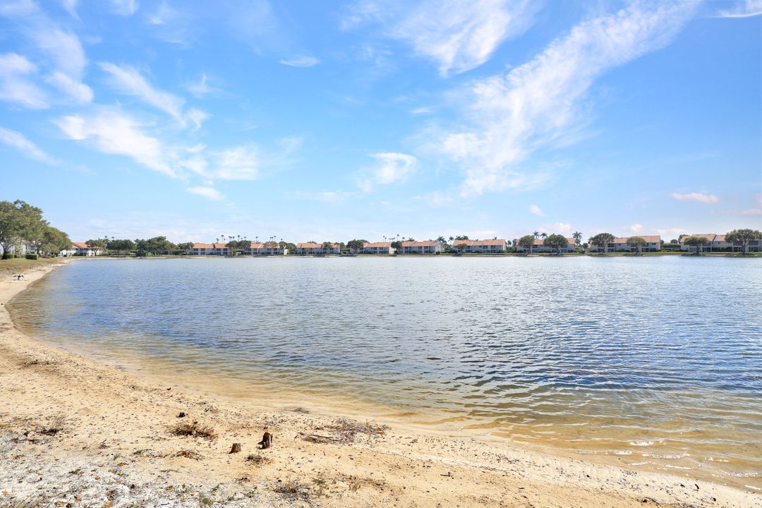 7742 Emerald Cir #V203, Naples, FL 34109