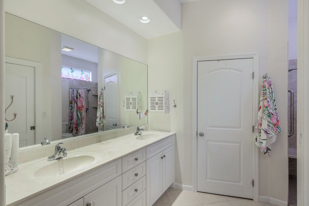 8687 Ibis Cove Cir, Naples, FL 34119