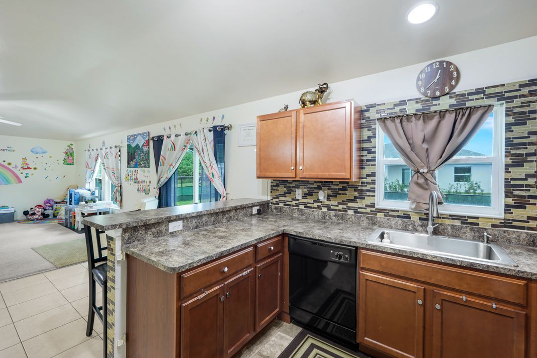 749 Chemstrand St E, Lehigh Acres, FL 33974