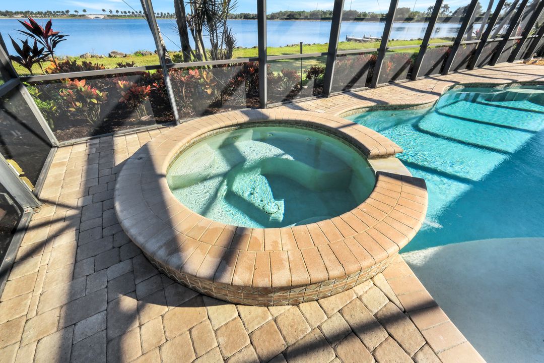 8765 Hideaway Harbor Ct, Naples, FL 34120