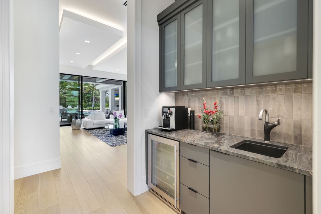 493 Carica Rd, Naples, FL 34108