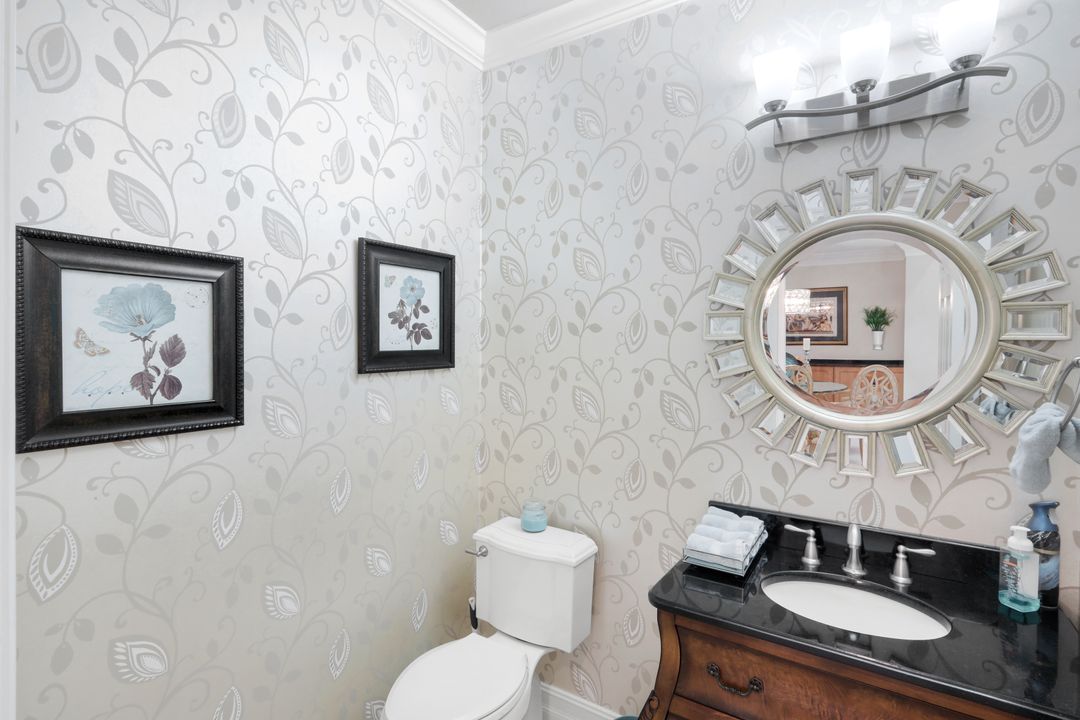 11426 Quail Village Way, Naples, FL 34119