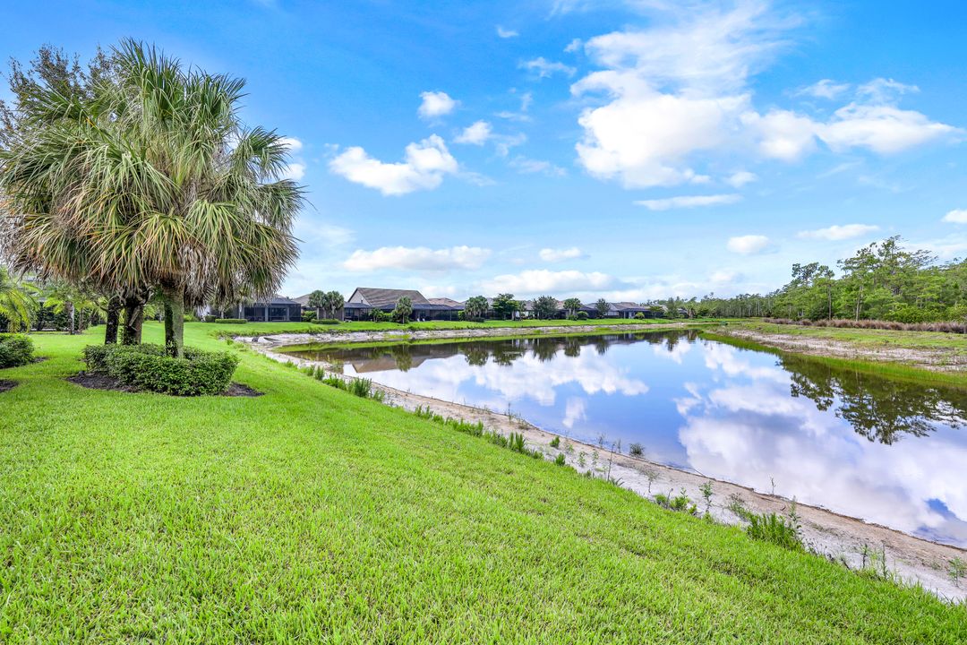 7408 Winding Cypress Dr, Naples, FL 34114