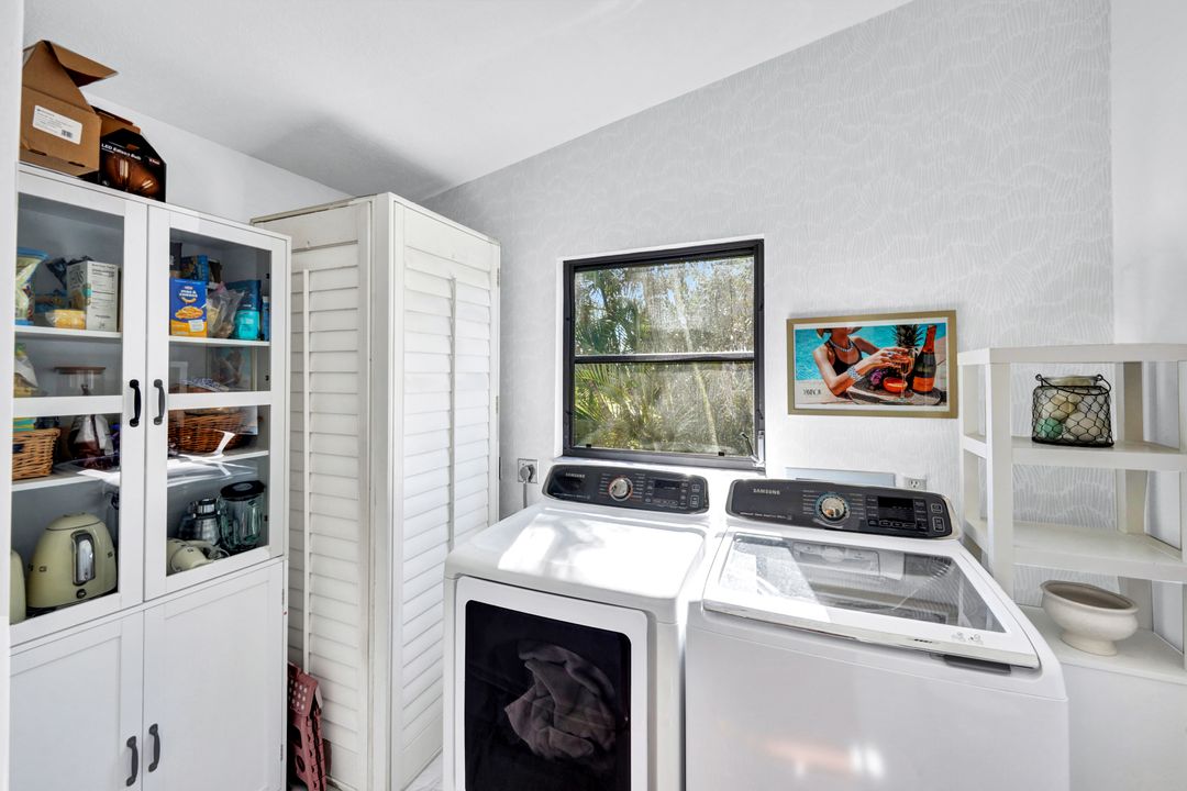 1285 Grand Canal Dr, Naples, FL 34110