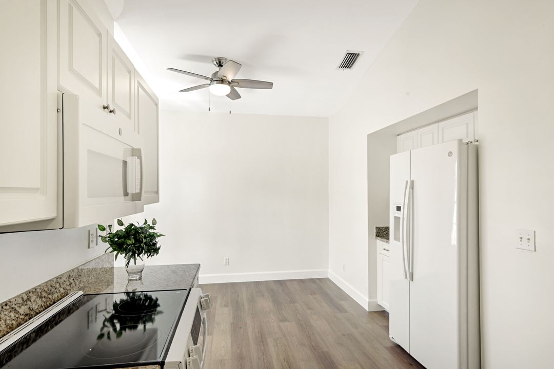 675 Wiggins Lake Dr #202, Naples, FL 34110