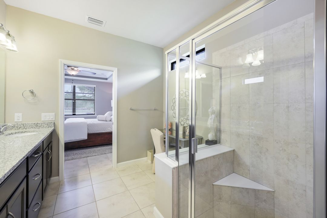 7408 Winding Cypress Dr, Naples, FL 34114