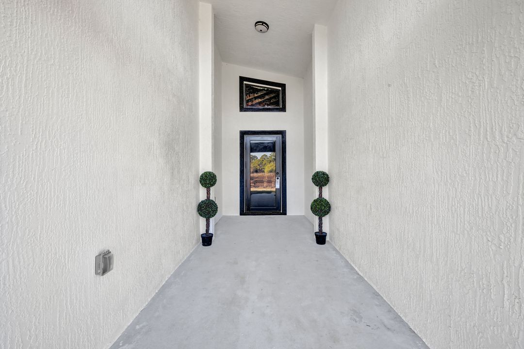 1222 Hilliard St E, Lehigh Acres, FL 33974